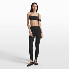 NikeSKIMS MATTE MICRO BRA | OBSIDIAN ON A MODEL FRONT VIEW @ | FOCUS: 0.0, 1.0, 0.9