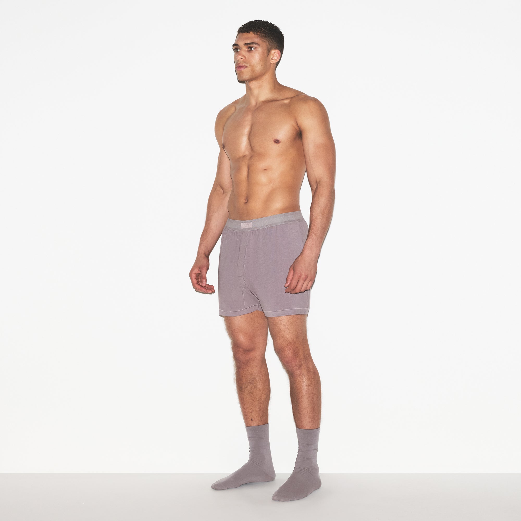 SKIMS COTTON MENS KNIT BOXER | ZINC ON A MODEL FRONT VIEW | FOCUS: 0.0, 1.0, 0.9