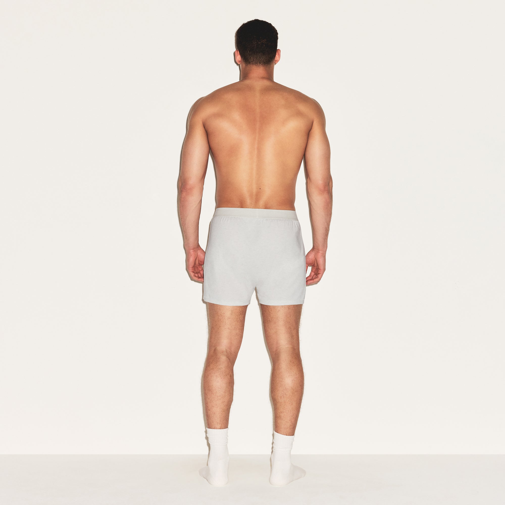 SKIMS COTTON MENS KNIT BOXER 3-PACK | HEATHER MULTI ON A MODEL FRONT VIEW | FOCUS: 0.0, 1.0, 0.9
