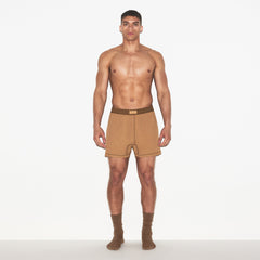 SKIMS COTTON MENS KNIT BOXER 3-PACK | RUSSET MULTI ON A MODEL FRONT VIEW | FOCUS: 0.0, 1.0, 0.9