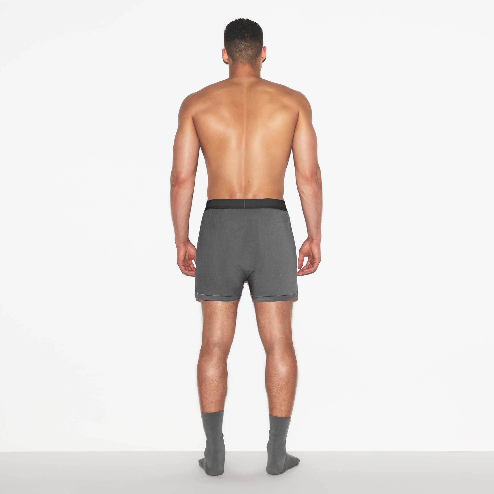 SKIMS COTTON MENS KNIT BOXER 3-PACK | RUSSET MULTI ON A MODEL FRONT VIEW | FOCUS: 0.0, 1.0, 0.9