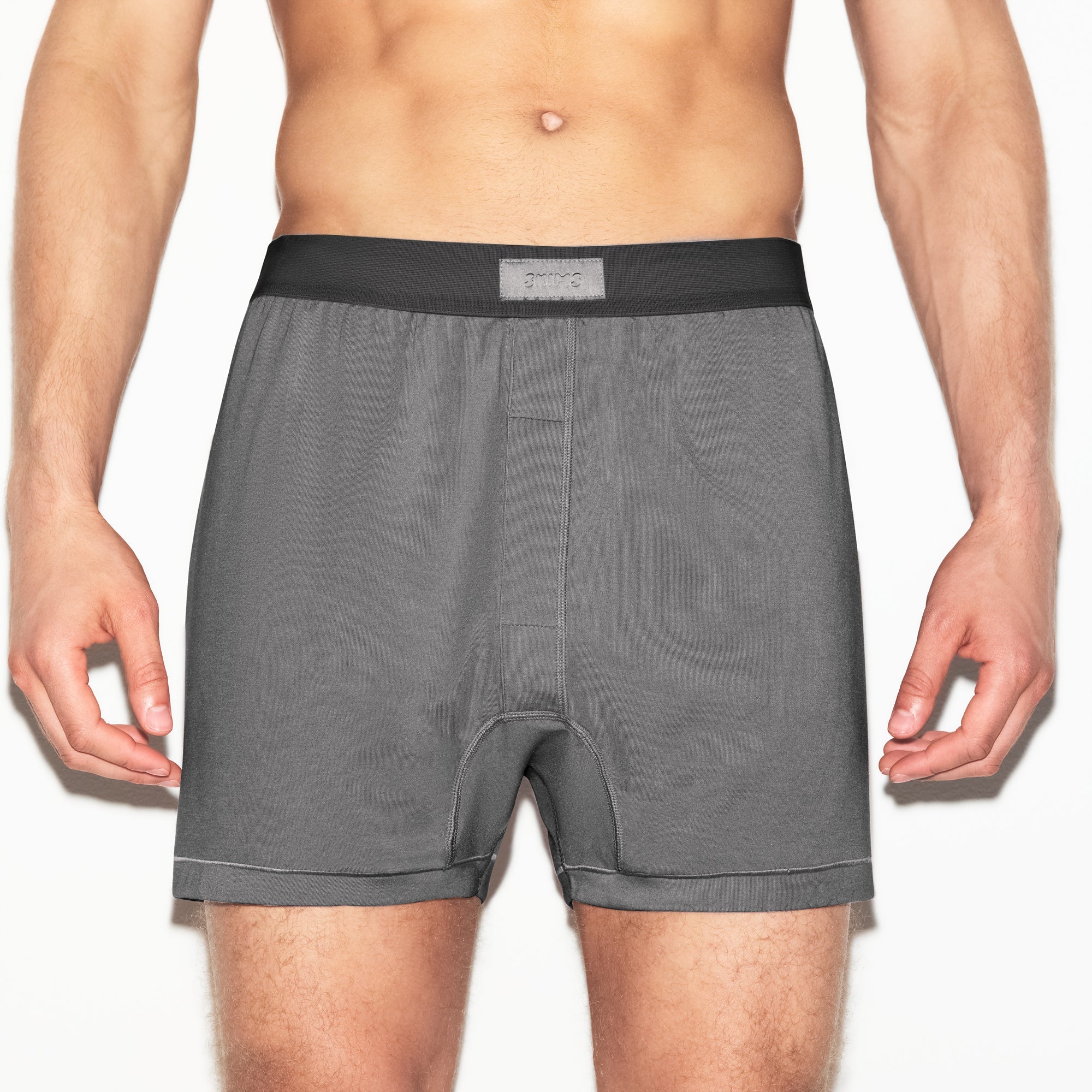 SKIMS COTTON MENS KNIT BOXER 3-PACK | RUSSET MULTI ON A MODEL SIDE VIEW | FOCUS: 0.0, 1.0, 0.9