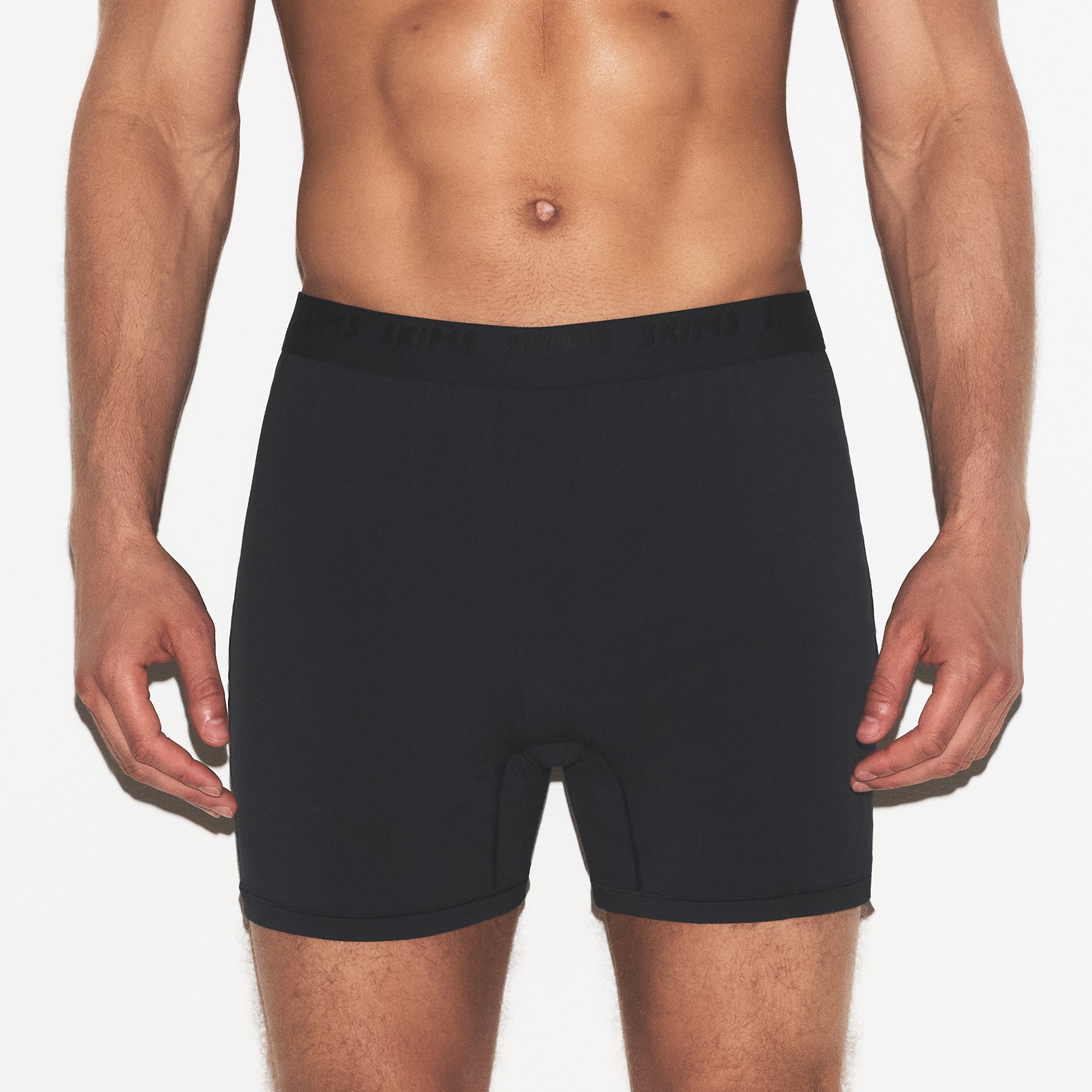 SKIMS STRETCH MENS KNIT BOXER 3-PACK | GUNMETAL MULTI ON A MODEL SIDE VIEW | FOCUS: 0.0, 1.0, 0.9