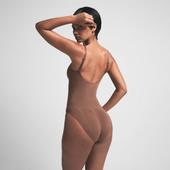 SEAMLESS SCULPT BRIEF BODYSUIT | JASPER ON A MODEL BACK VIEW
