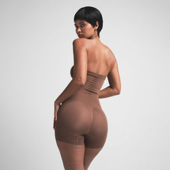 SEAMLESS SCULPT STRAPLESS SHORTIE BODYSUIT | JASPER ON A MODEL BACK VIEW