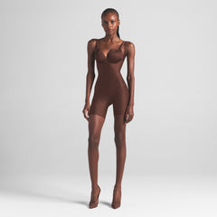 SKIMS BODY CORE SCULPT OPEN BUST MID THIGH BODYSUIT | COCOA ON A MODEL FRONT VIEW