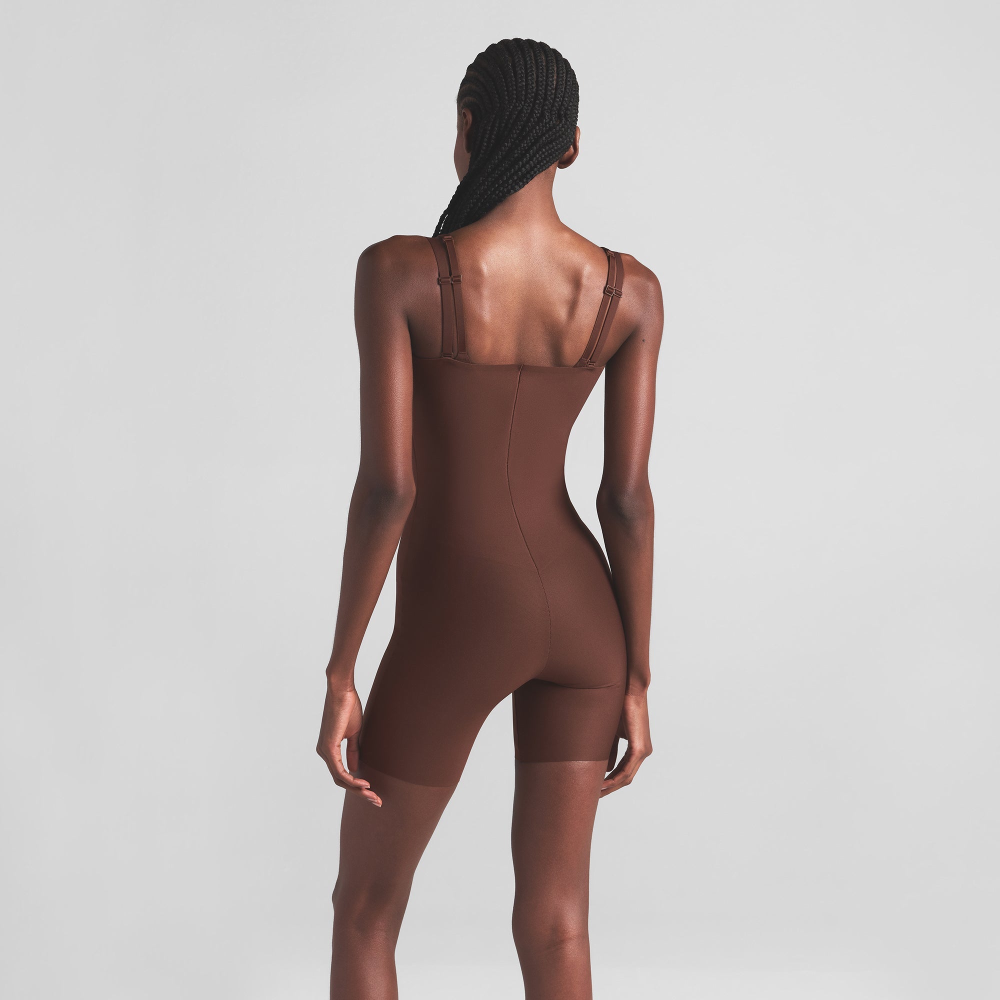 SKIMS BODY CORE SCULPT OPEN BUST MID THIGH BODYSUIT | COCOA ON A MODEL BACK VIEW