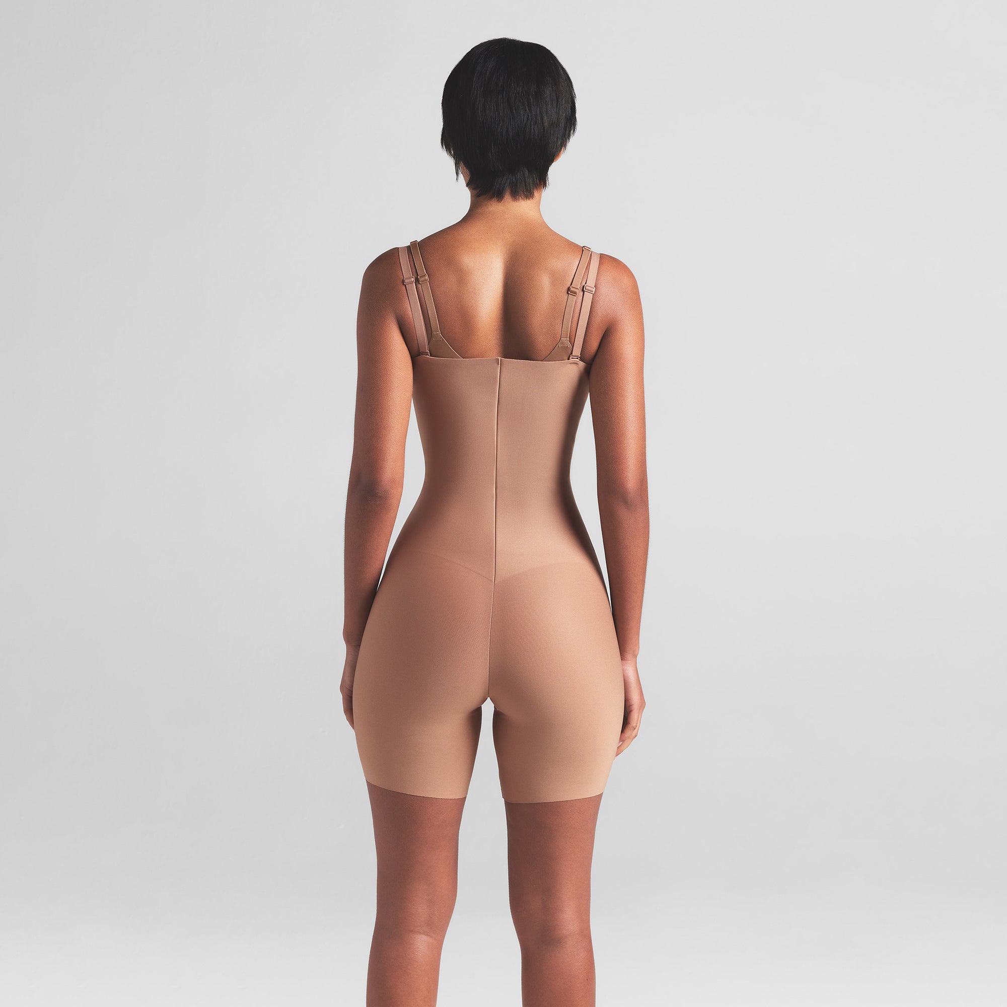 SKIMS BODY CORE SCULPT OPEN BUST MID THIGH BODYSUIT | SIENNA ON A MODEL BACK VIEW