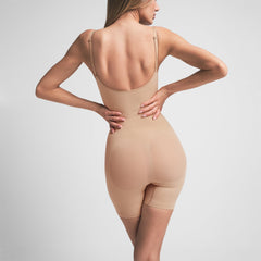 SEAMLESS SCULPT MID THIGH BODYSUIT | CLAY ON A MODEL BACK VIEW