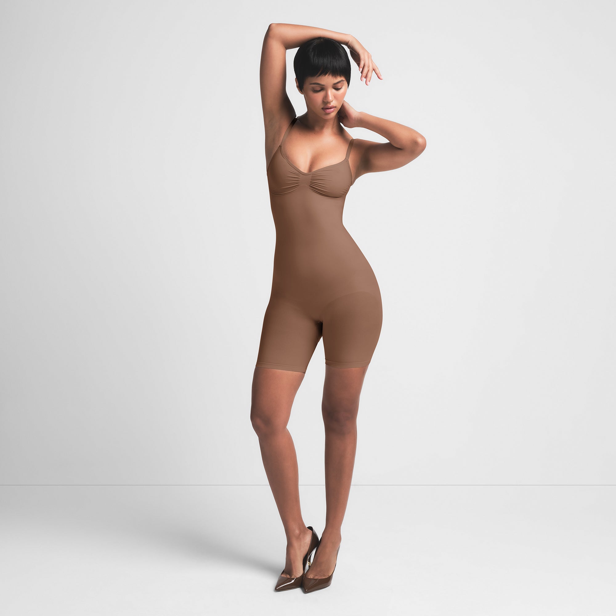 SEAMLESS SCULPT MID THIGH BODYSUIT | JASPER ON A MODEL FRONT VIEW