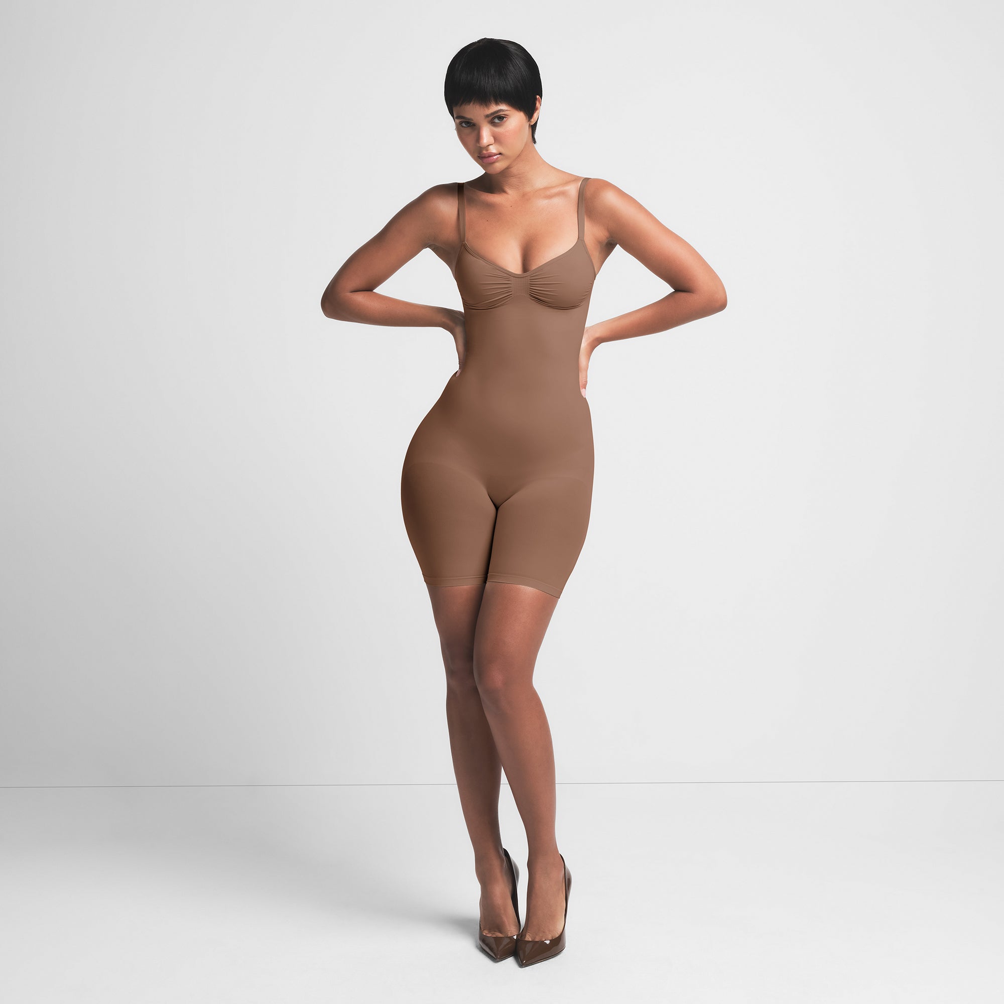 SEAMLESS SCULPT MID THIGH BODYSUIT | JASPER ON A MODEL FRONT VIEW