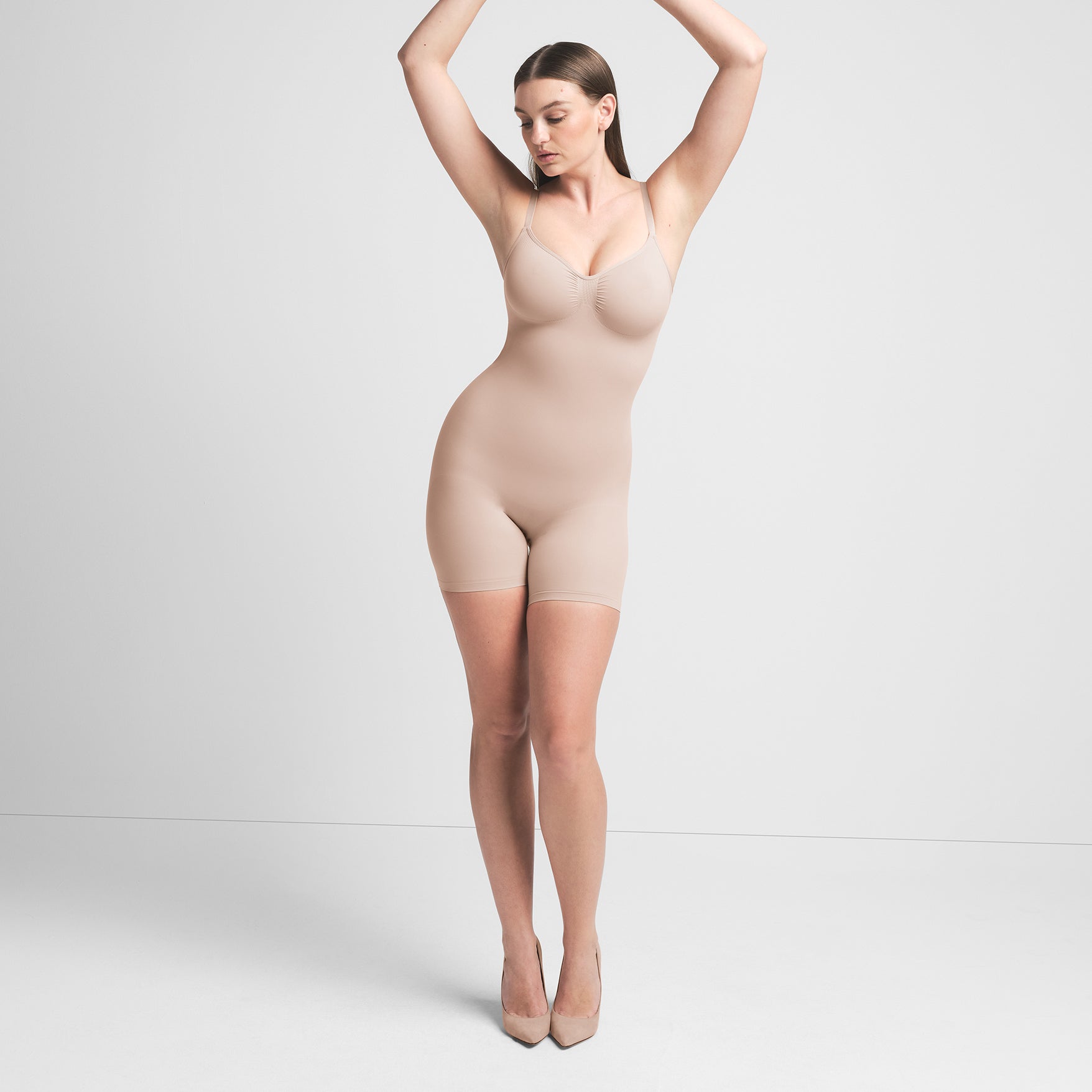 SEAMLESS SCULPT MID THIGH BODYSUIT | MICA ON A MODEL FRONT VIEW