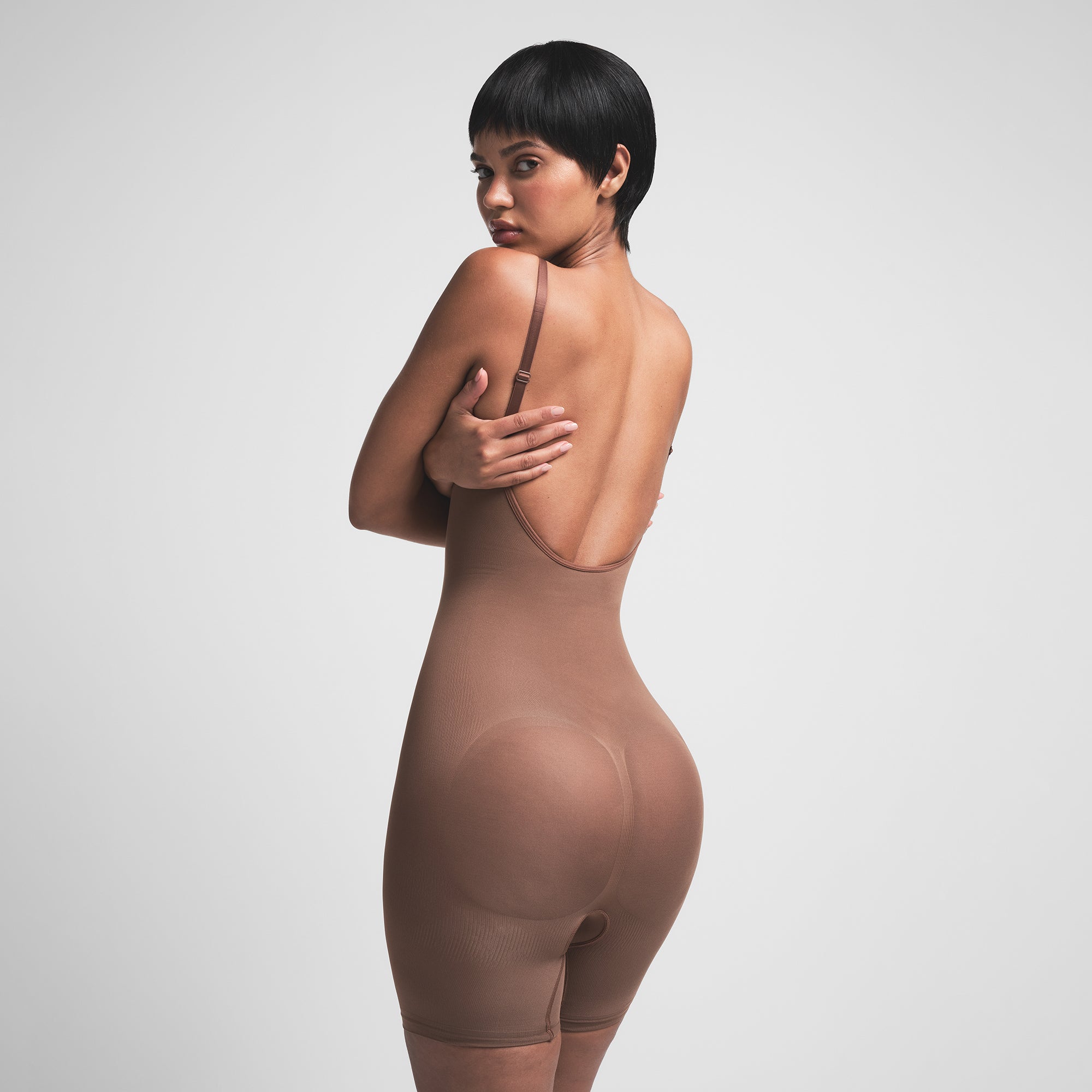 SEAMLESS SCULPT LOW BACK MID THIGH BODYSUIT | JASPER ON A MODEL BACK VIEW