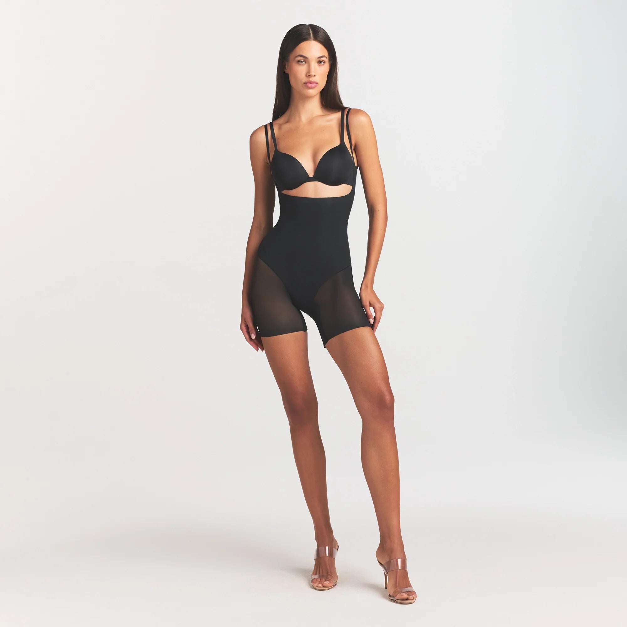 POWER MESH SHAPEWEAR CORE SCULPT OPEN BUST MID THIGH BODYSUIT | ONYX ON A MODEL FRONT VIEW @