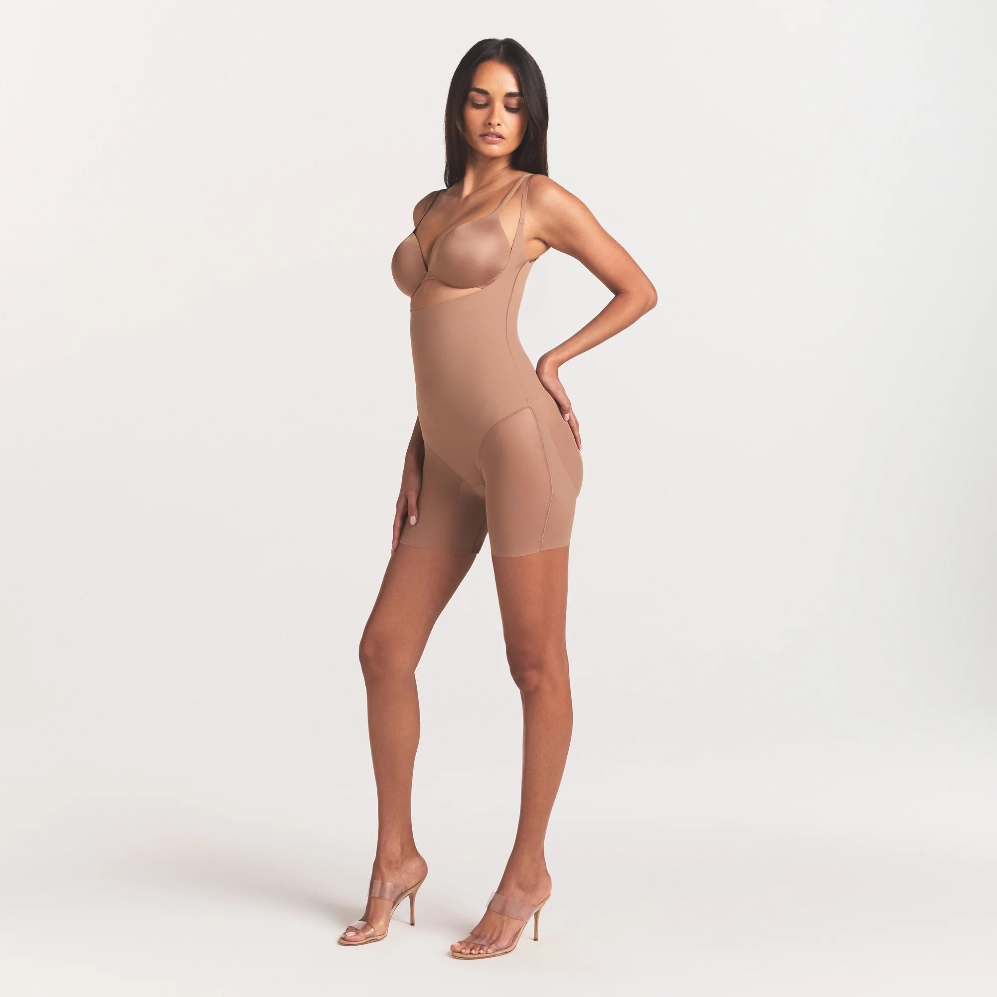 SKIMS BODY CORE SCULPT BACK SMOOTHING OPEN BUST MID THIGH BODYSUIT | SIENNA ON A MODEL FRONT VIEW @