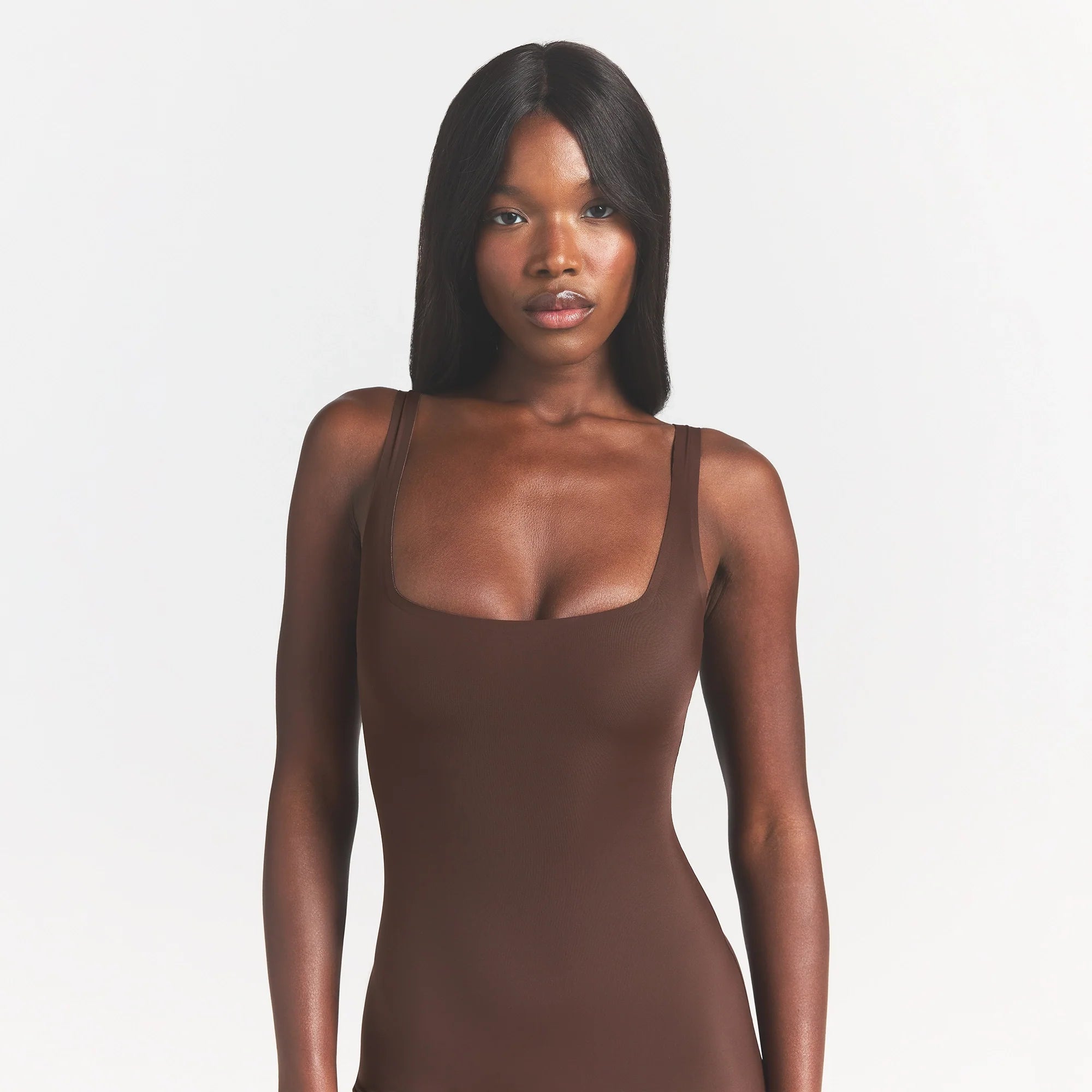 COOL SHAPEWEAR MID THIGH BODYSUIT | COCOA ON A MODEL FRONT VIEW @ | FOCUS: 0.0, 1.0, 0.9