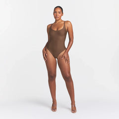 SKIMS BODY SCOOP LOW BACK THONG BODYSUIT | JASPER ON A MODEL FRONT VIEW @