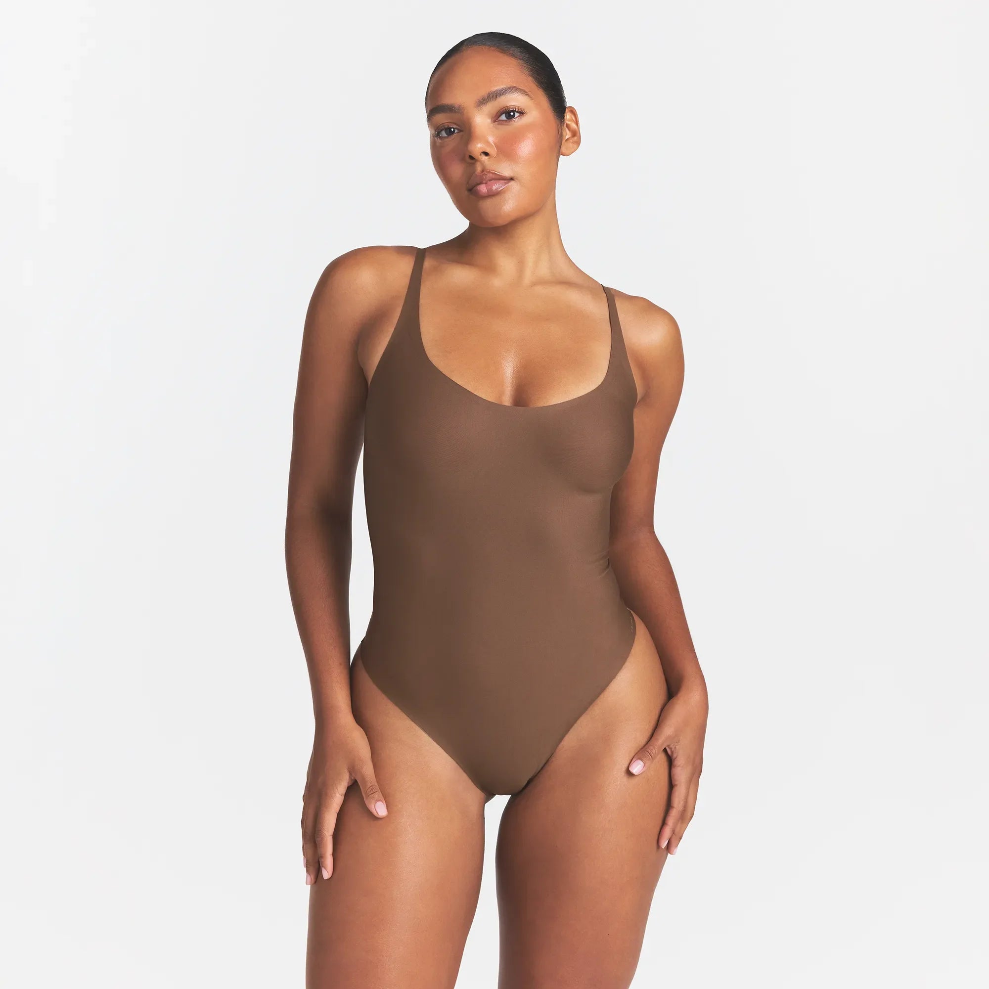 SKIMS BODY SCOOP LOW BACK THONG BODYSUIT | JASPER ON A MODEL FRONT VIEW @
