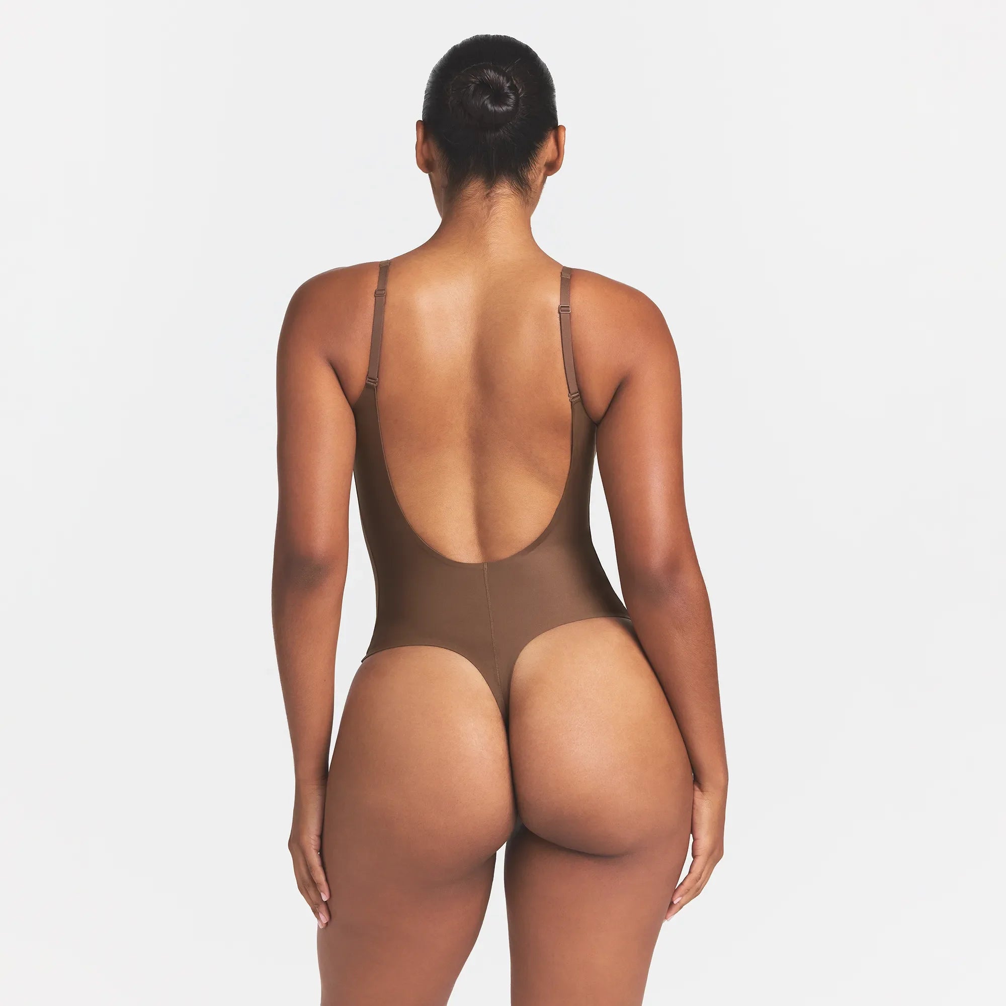 SKIMS BODY SCOOP LOW BACK THONG BODYSUIT | JASPER ON A MODEL BACK VIEW @