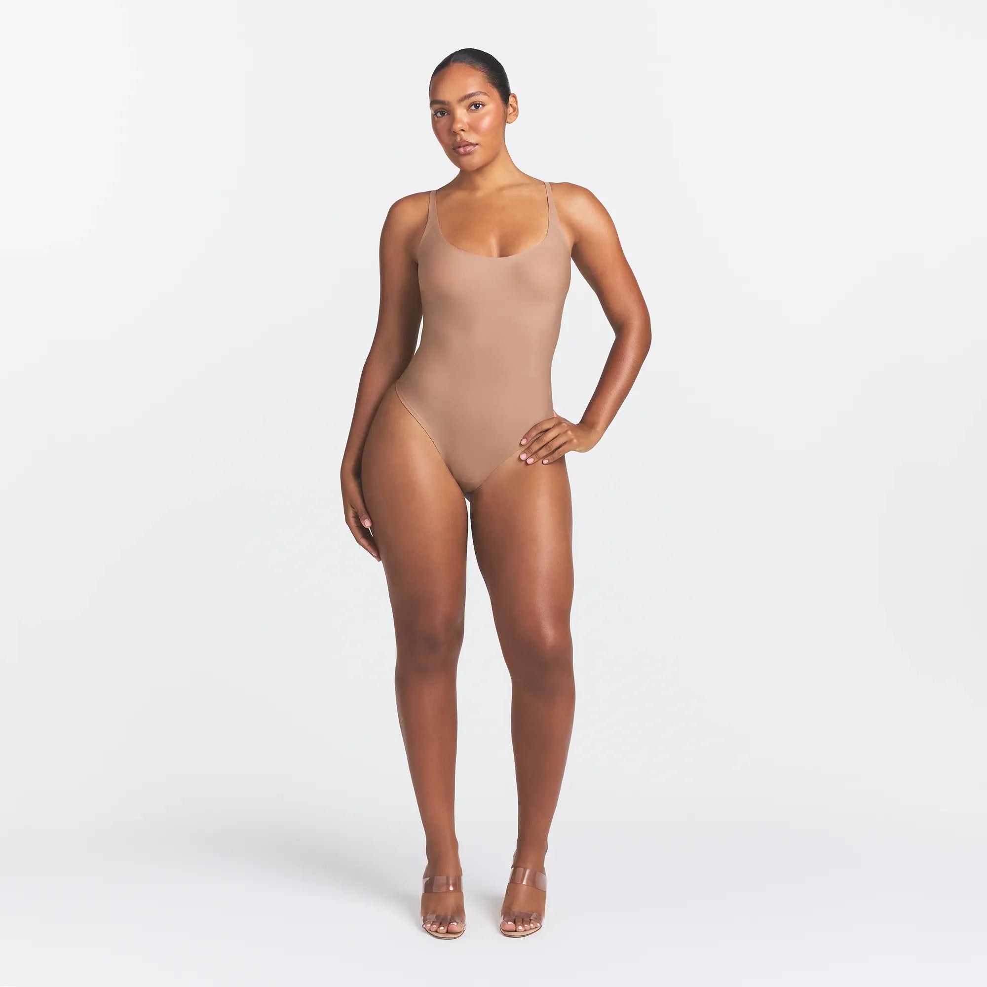 SKIMS BODY SCOOP LOW BACK THONG BODYSUIT | SIENNA ON A MODEL FRONT VIEW @