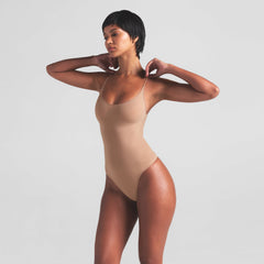 SHEER SEAMLESS THONG BODYSUIT | SIENNA ON A MODEL SIDE VIEW