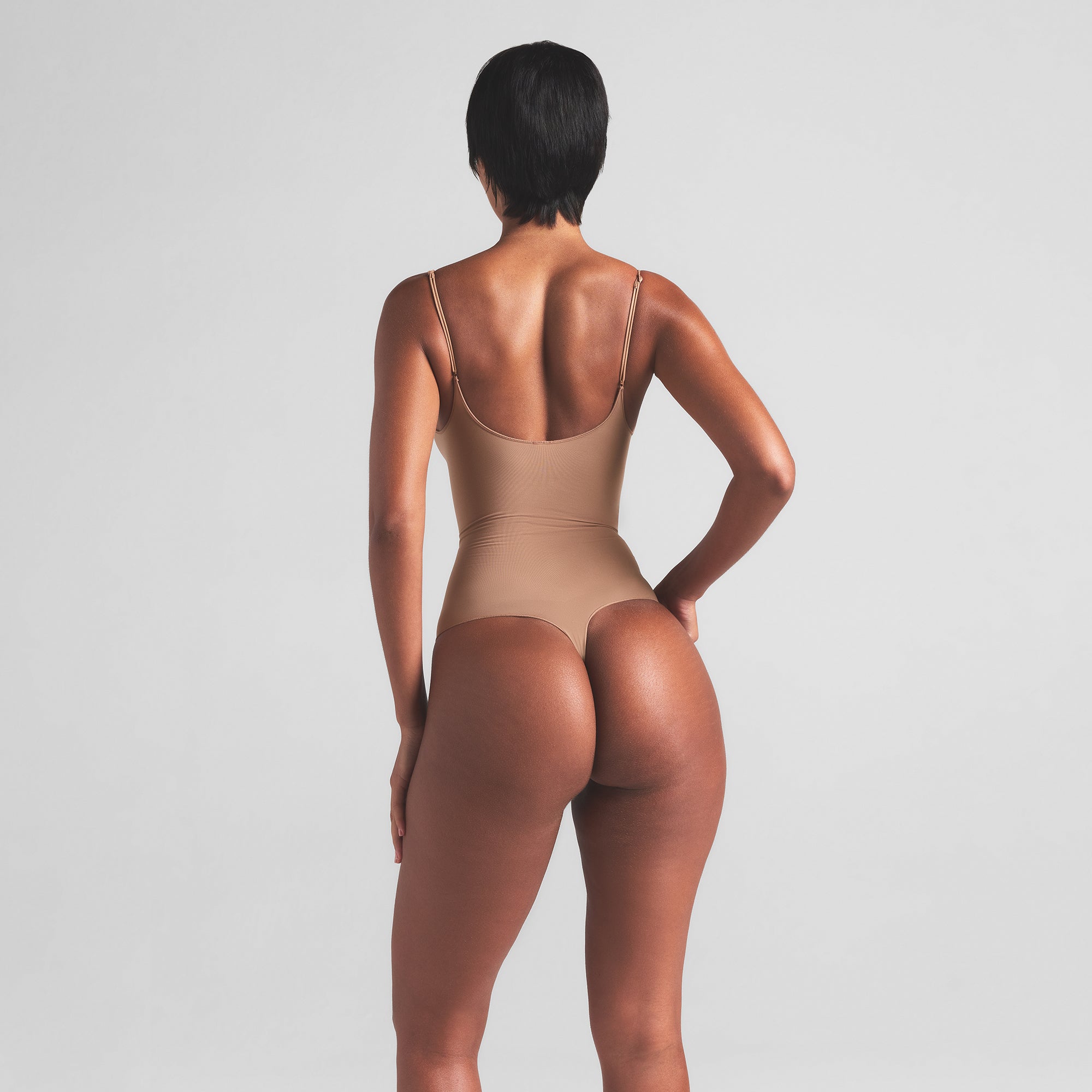 SHEER SEAMLESS THONG BODYSUIT | SIENNA ON A MODEL BACK VIEW