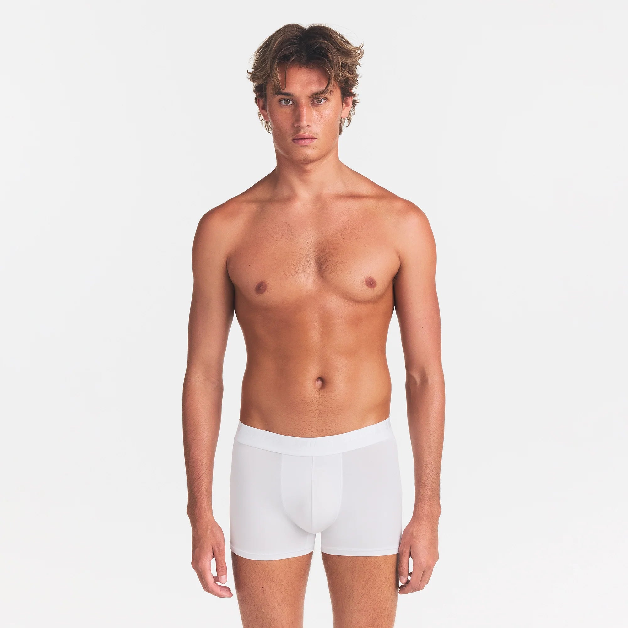 SKIMS STRETCH MENS 5" BOXER BRIEF | CHALK ON A MODEL FRONT VIEW