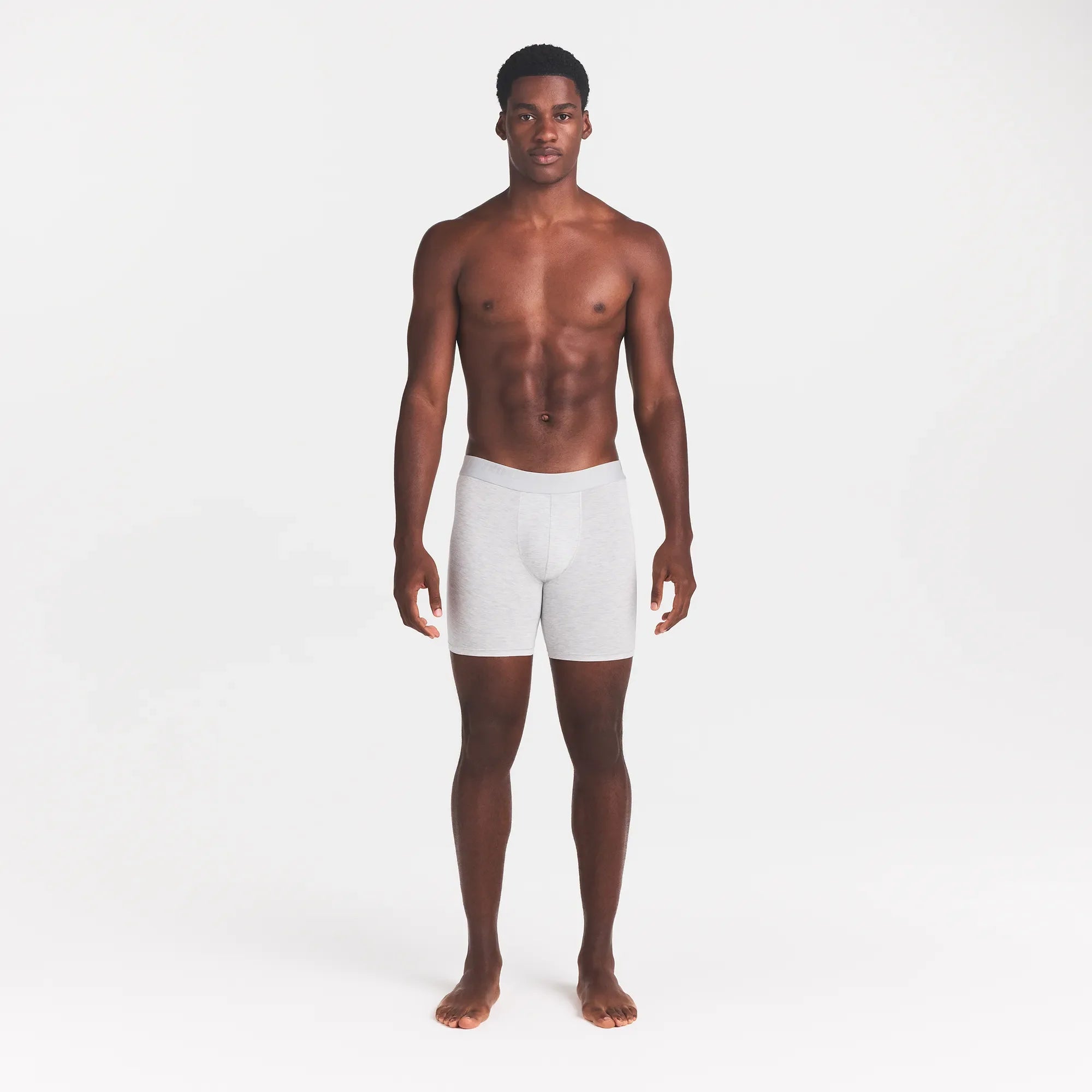 SKIMS STRETCH MENS 5" BOXER BRIEF | LIGHT HEATHER GREY ON A MODEL FRONT VIEW @ | FOCUS: 0.0, 1.0, 0.9