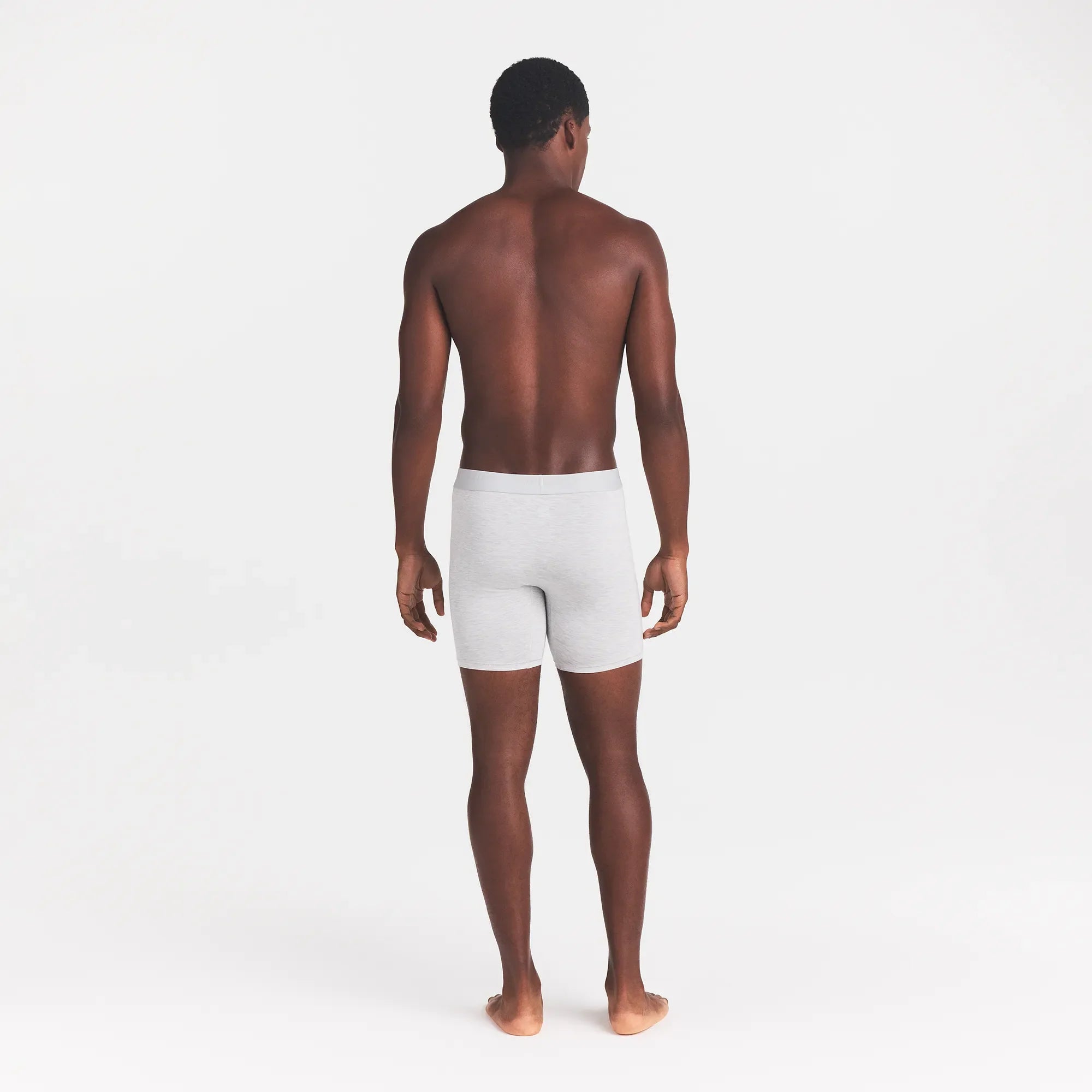 SKIMS STRETCH MENS 5" BOXER BRIEF | LIGHT HEATHER GREY ON A MODEL BACK VIEW @ | FOCUS: 0.0, 1.0, 0.9