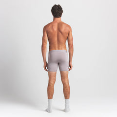 SKIMS STRETCH MENS 5" BOXER BRIEF | OYSTER ON A MODEL BACK VIEW @ | FOCUS: 0.0, 1.0, 0.9