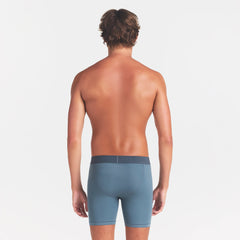 SKIMS COTTON MENS 5" BOXER BRIEF | KYANITE ON A MODEL BACK VIEW