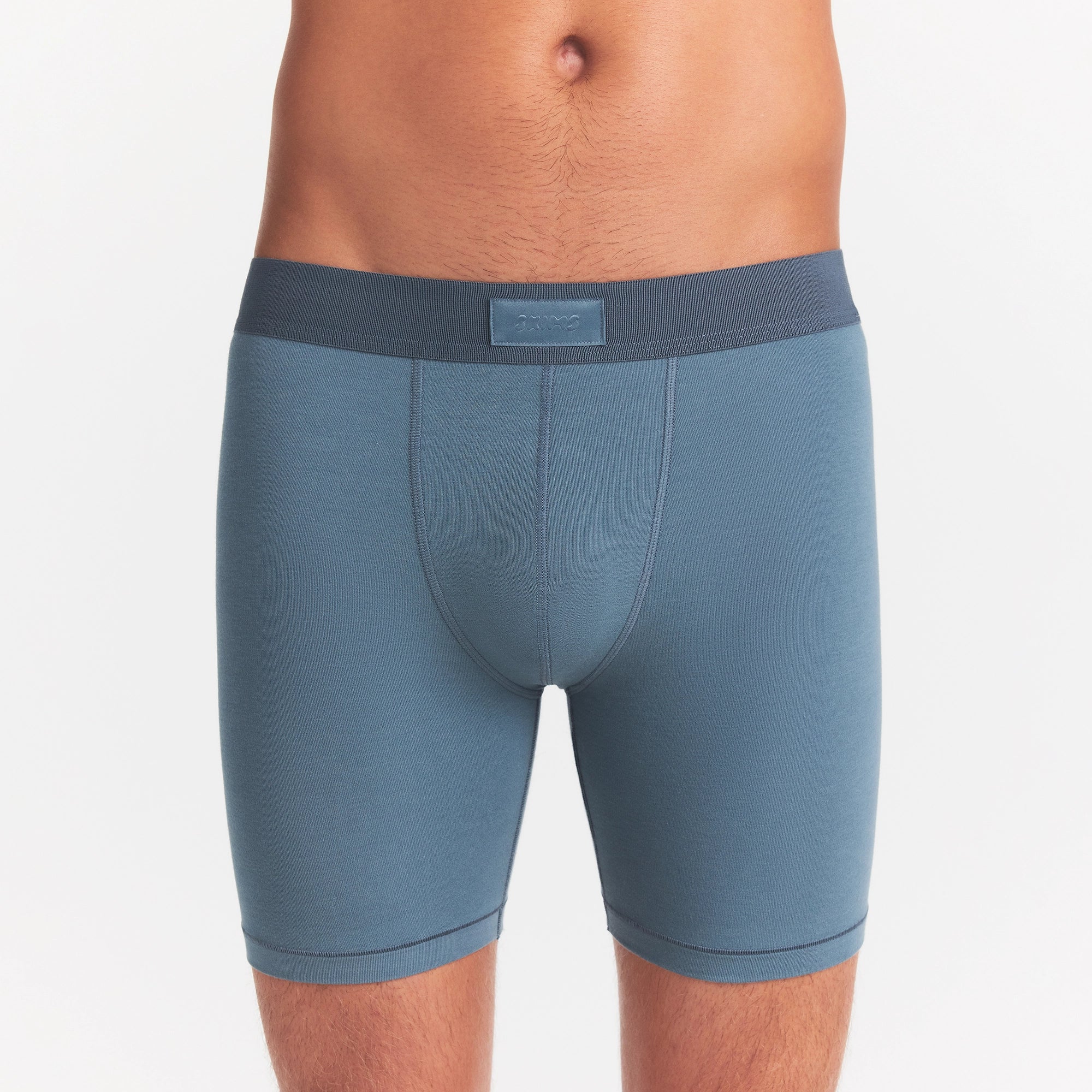 SKIMS COTTON MENS 5" BOXER BRIEF | KYANITE ON A MODEL FRONT VIEW