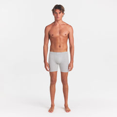 SKIMS COTTON MENS 5" BOXER BRIEF | LIGHT HEATHER GREY ON A MODEL FRONT VIEW