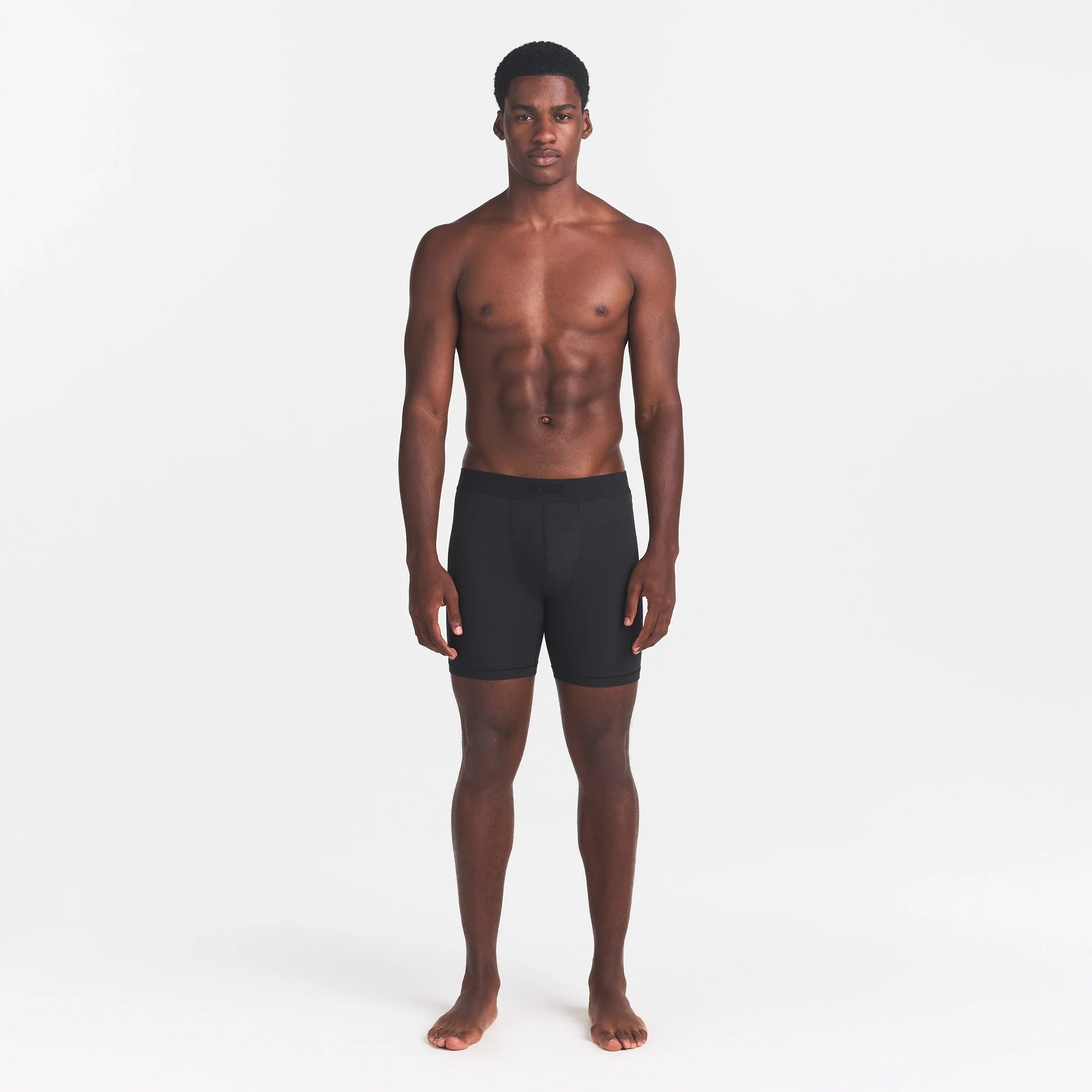 SKIMS COTTON MENS 5" BOXER BRIEF | ONYX ON A MODEL FRONT VIEW @ | FOCUS: 0.0, 1.0, 0.9