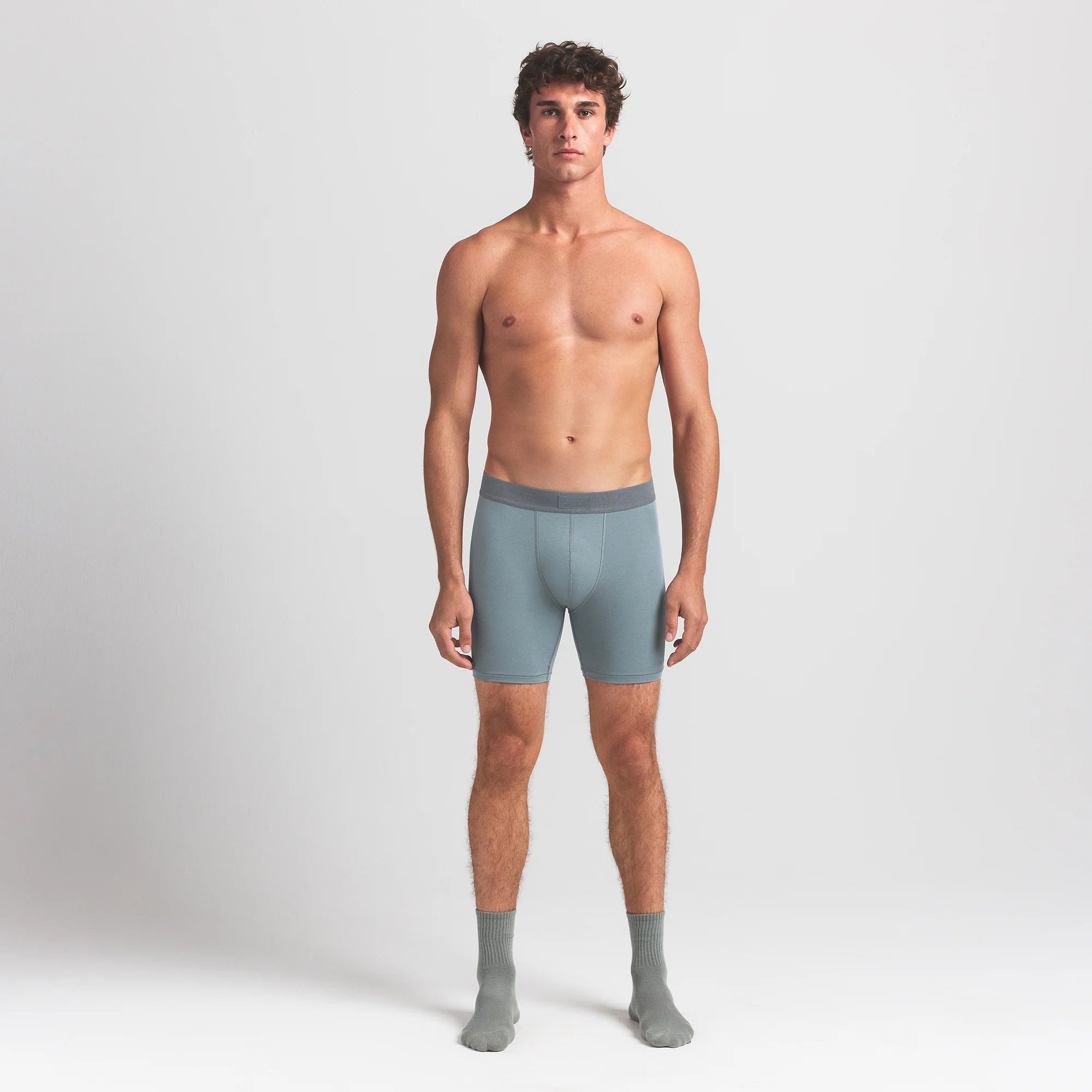 SKIMS COTTON MENS 5" BOXER BRIEF | SKY ON A MODEL FRONT VIEW @ | FOCUS: 0.0, 1.0, 0.9