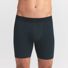 SKIMS COTTON MENS 5" BOXER BRIEF | VERDANT ON A MODEL FRONT VIEW @ | FOCUS: 0.0, 1.0, 0.9