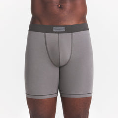 SKIMS COTTON MENS 5" BOXER BRIEF | WASHED GUNMETAL ON A MODEL FRONT VIEW