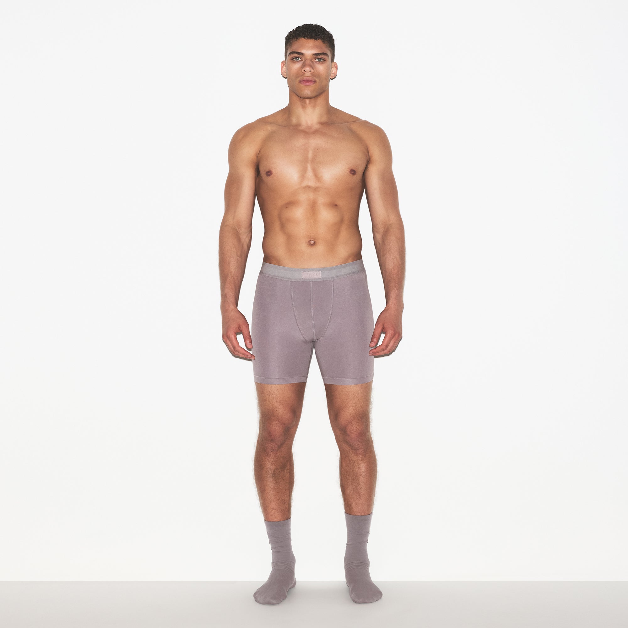 SKIMS COTTON MENS 5 INCH BOXER BRIEF | ZINC ON A MODEL FRONT VIEW | FOCUS: 0.0, 1.0, 0.9