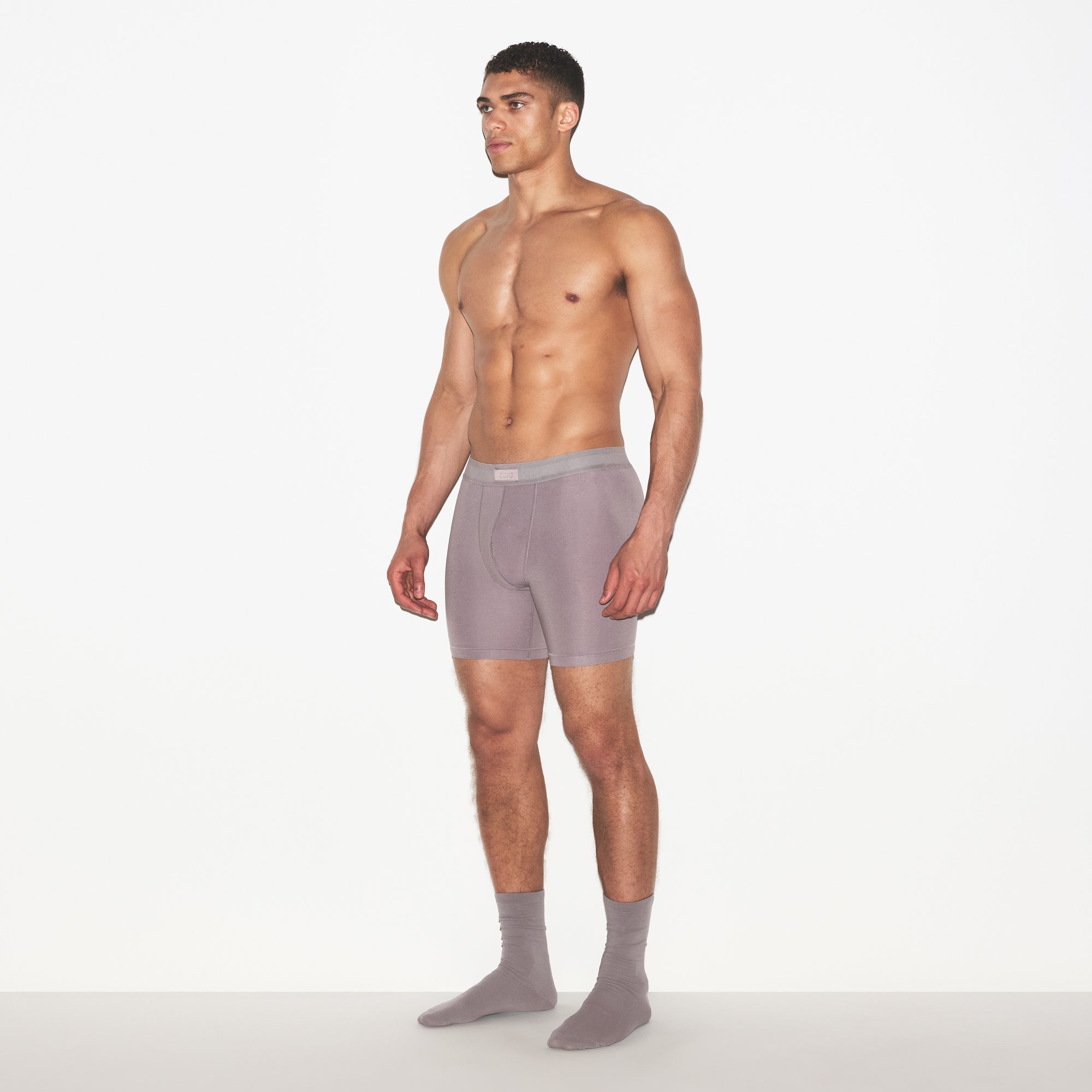 SKIMS COTTON MENS 5 INCH BOXER BRIEF | ZINC ON A MODEL FRONT VIEW | FOCUS: 0.0, 1.0, 0.9