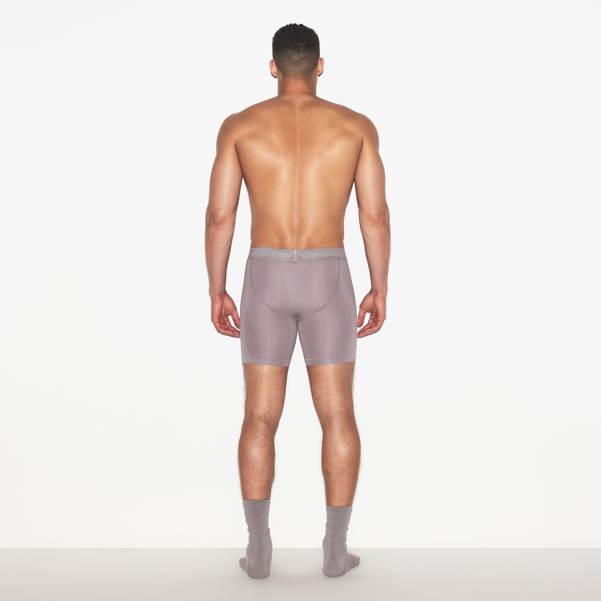 SKIMS COTTON MENS 5 INCH BOXER BRIEF | ZINC ON A MODEL FRONT VIEW | FOCUS: 0.0, 1.0, 0.9