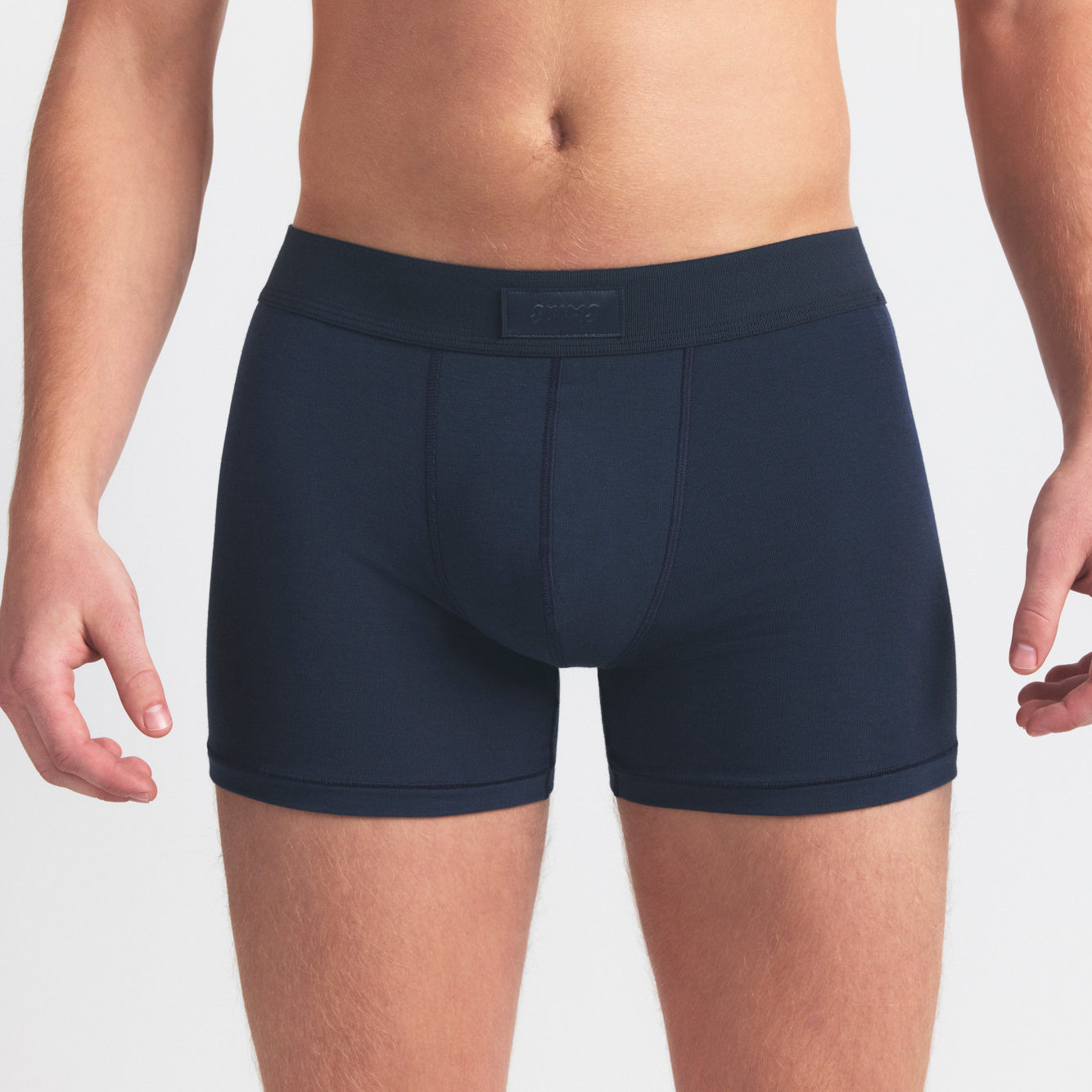 SKIMS COTTON MENS 3" BOXER BRIEF 3-PACK | BLUE BLACK MULTI ON A MODEL SIDE VIEW @ | FOCUS: 0.0, 1.0, 0.9