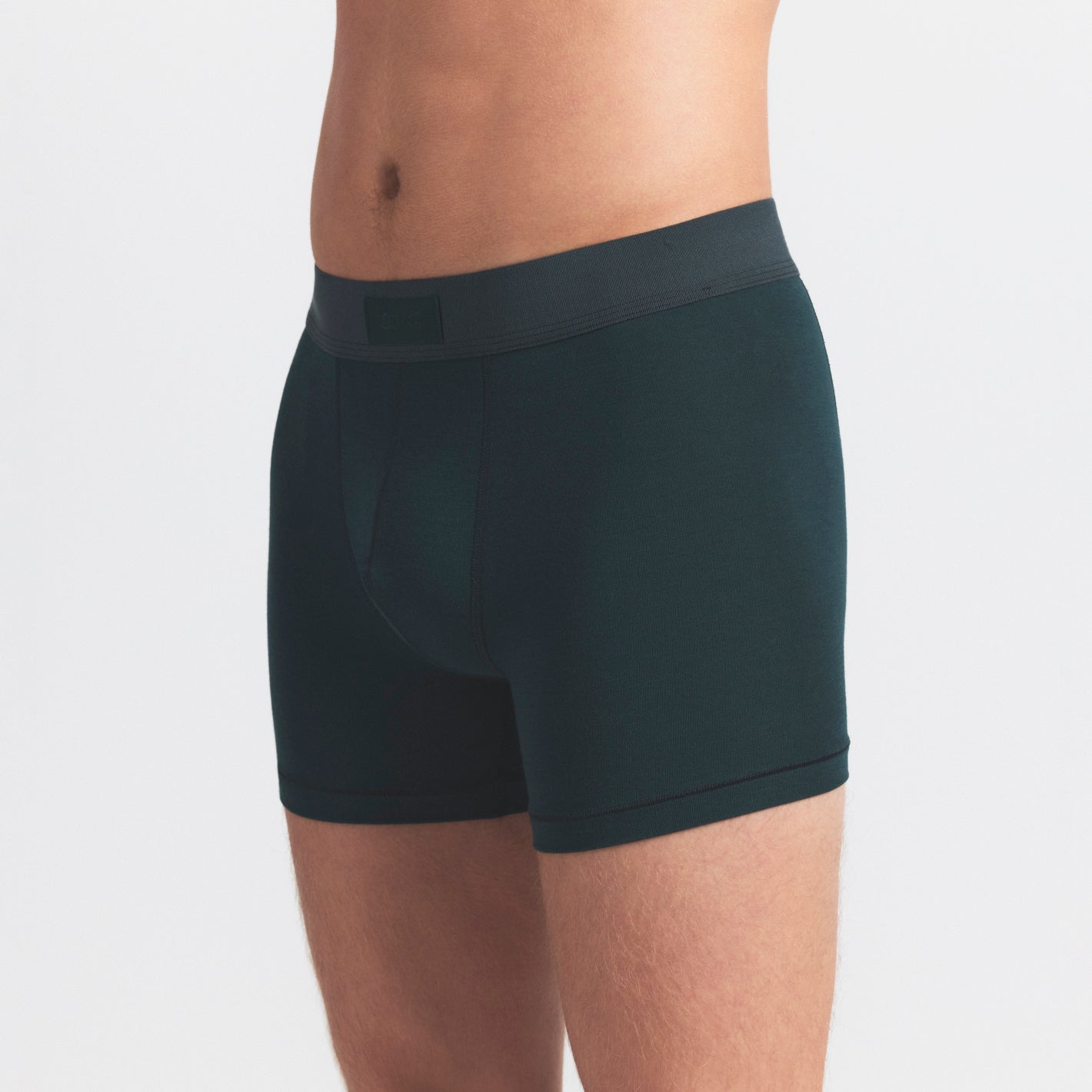 SKIMS COTTON MENS 3" BOXER BRIEF 3-PACK | BLUE BLACK MULTI ON A MODEL SIDE VIEW @ | FOCUS: 0.0, 1.0, 0.9