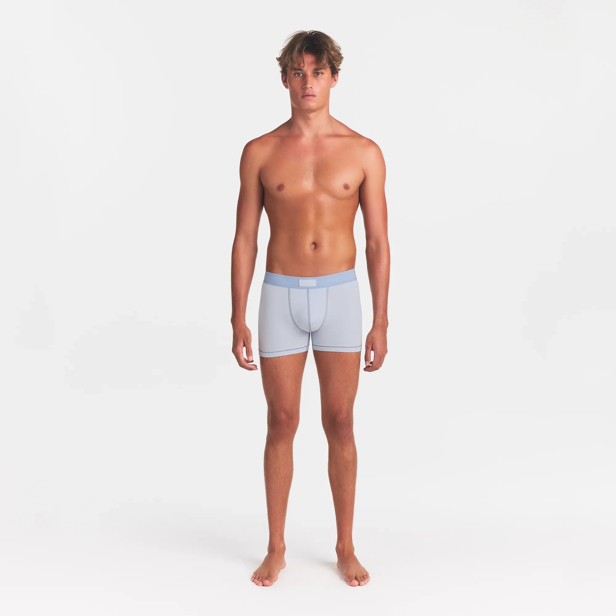 SKIMS COTTON MENS 3" BOXER BRIEF 3-PACK | NIMBUS MULTI ON A MODEL FRONT VIEW @ | FOCUS: 0.0, 1.0, 0.9