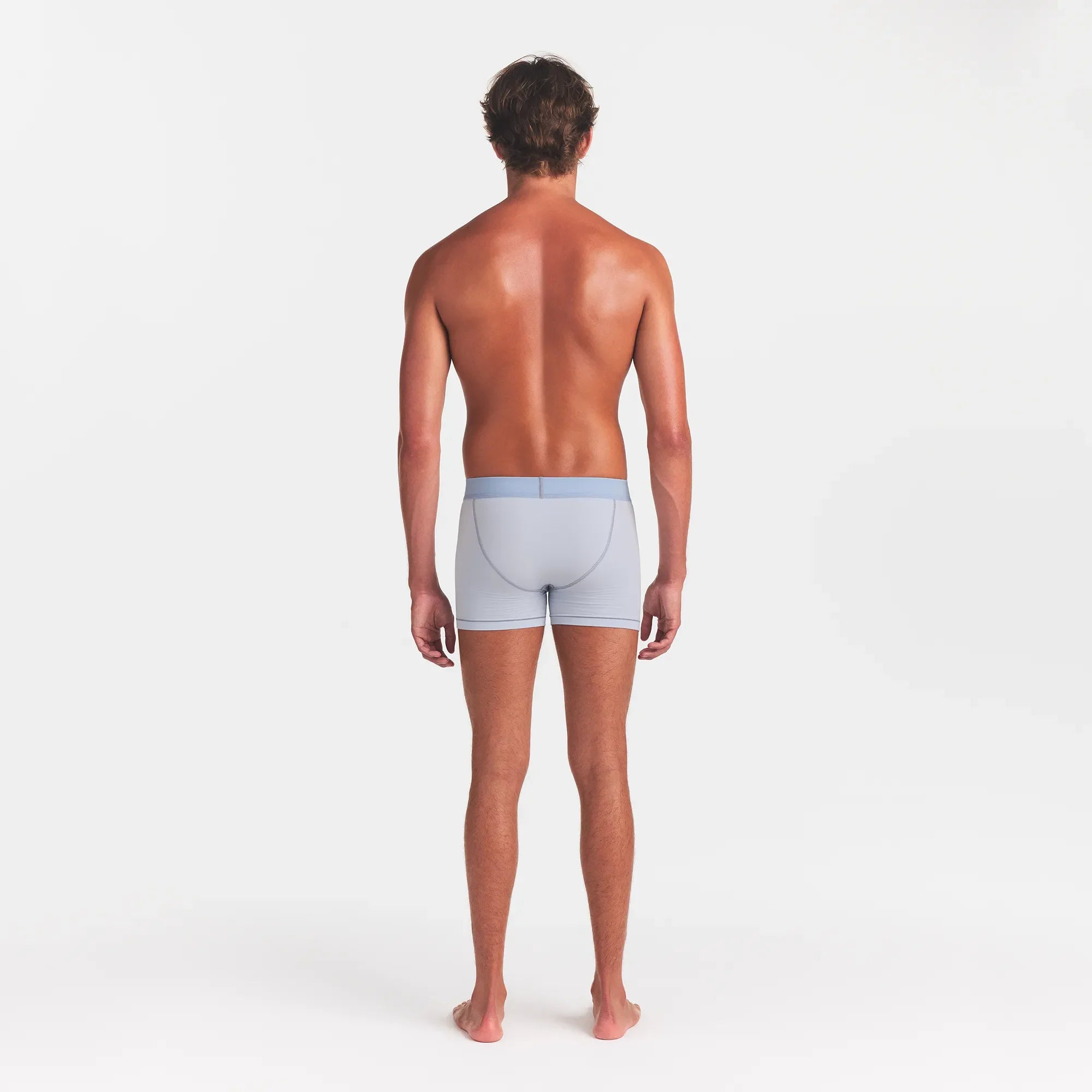 SKIMS COTTON MENS 3" BOXER BRIEF 3-PACK | NIMBUS MULTI ON A MODEL BACK VIEW