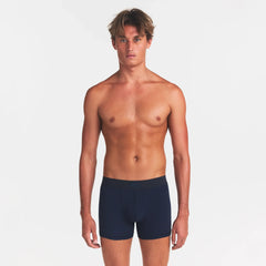 SKIMS COTTON MENS 3" BOXER BRIEF 3-PACK | NIMBUS MULTI ON A MODEL FRONT VIEW