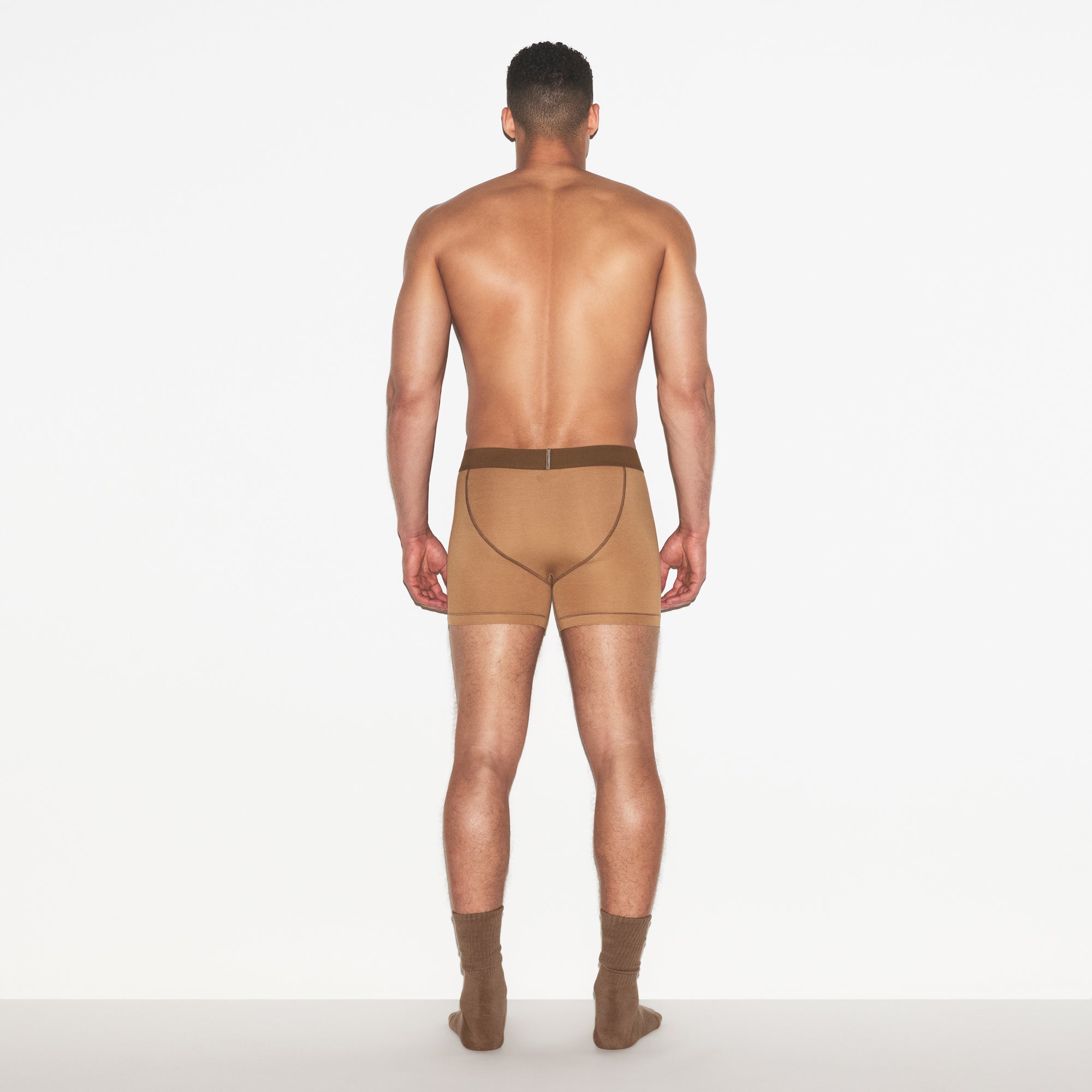 SKIMS COTTON MENS 3 INCH BOXER BRIEF 3-PACK | RUSSET MULTI ON A MODEL FRONT VIEW | FOCUS: 0.0, 1.0, 0.9