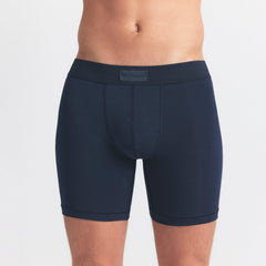 SKIMS COTTON MENS 5" BOXER BRIEF 3-PACK | BLUE BLACK MULTI ON A MODEL SIDE VIEW @ | FOCUS: 0.0, 1.0, 0.9