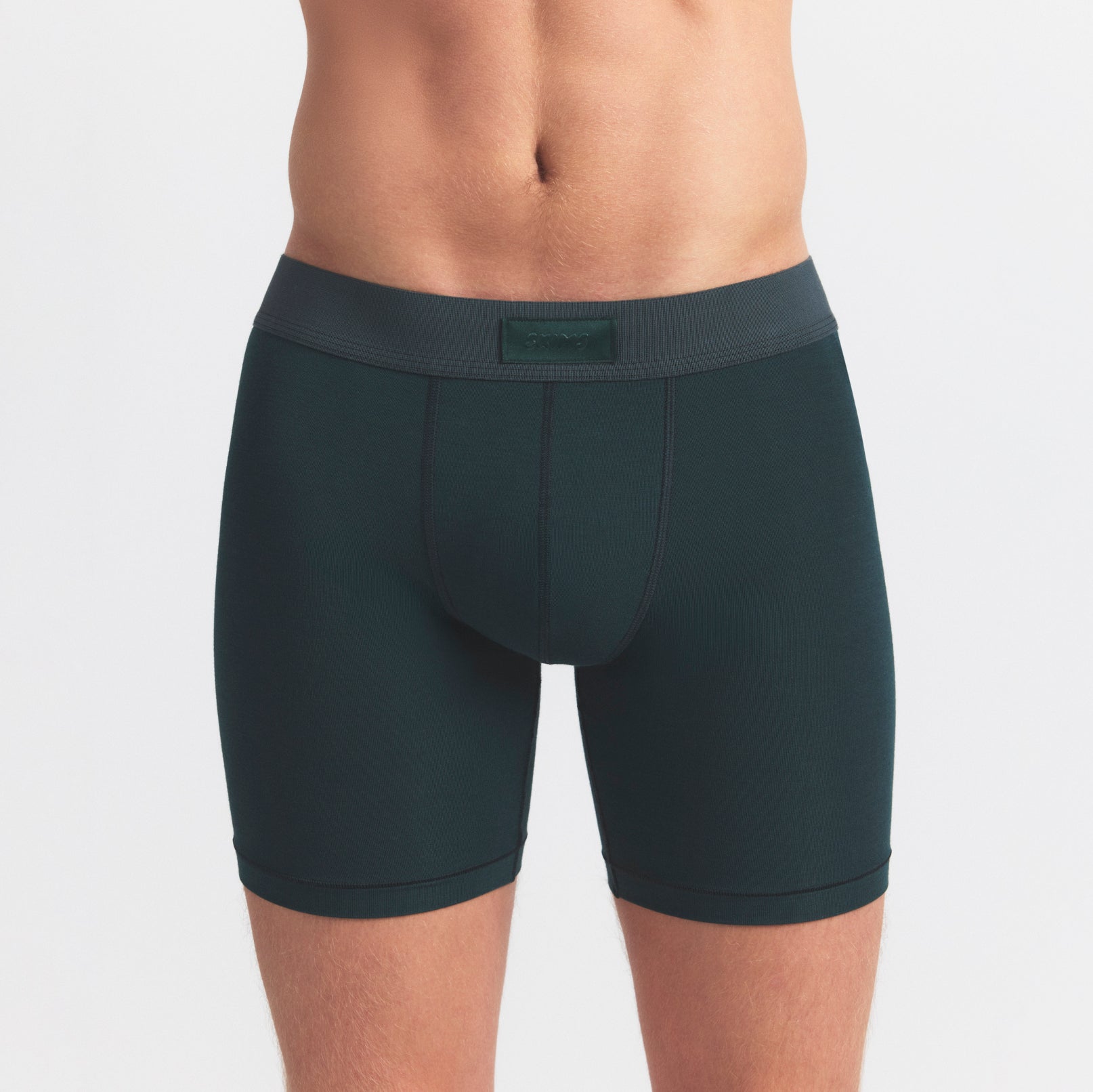 SKIMS COTTON MENS 5" BOXER BRIEF 3-PACK | BLUE BLACK MULTI ON A MODEL SIDE VIEW @ | FOCUS: 0.0, 1.0, 0.9