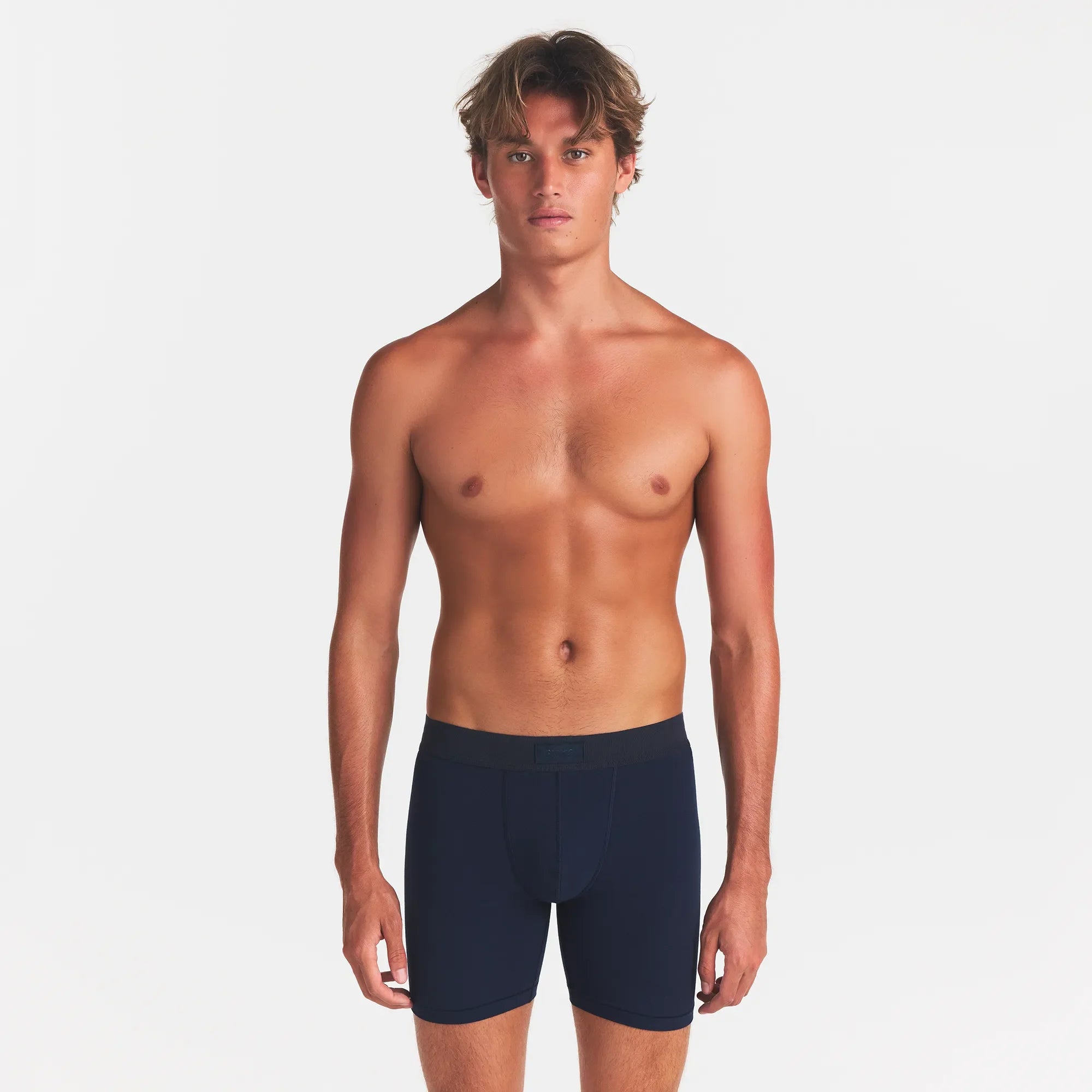 SKIMS COTTON MENS 5" BOXER BRIEF 3-PACK | NIMBUS MULTI ON A MODEL FRONT VIEW