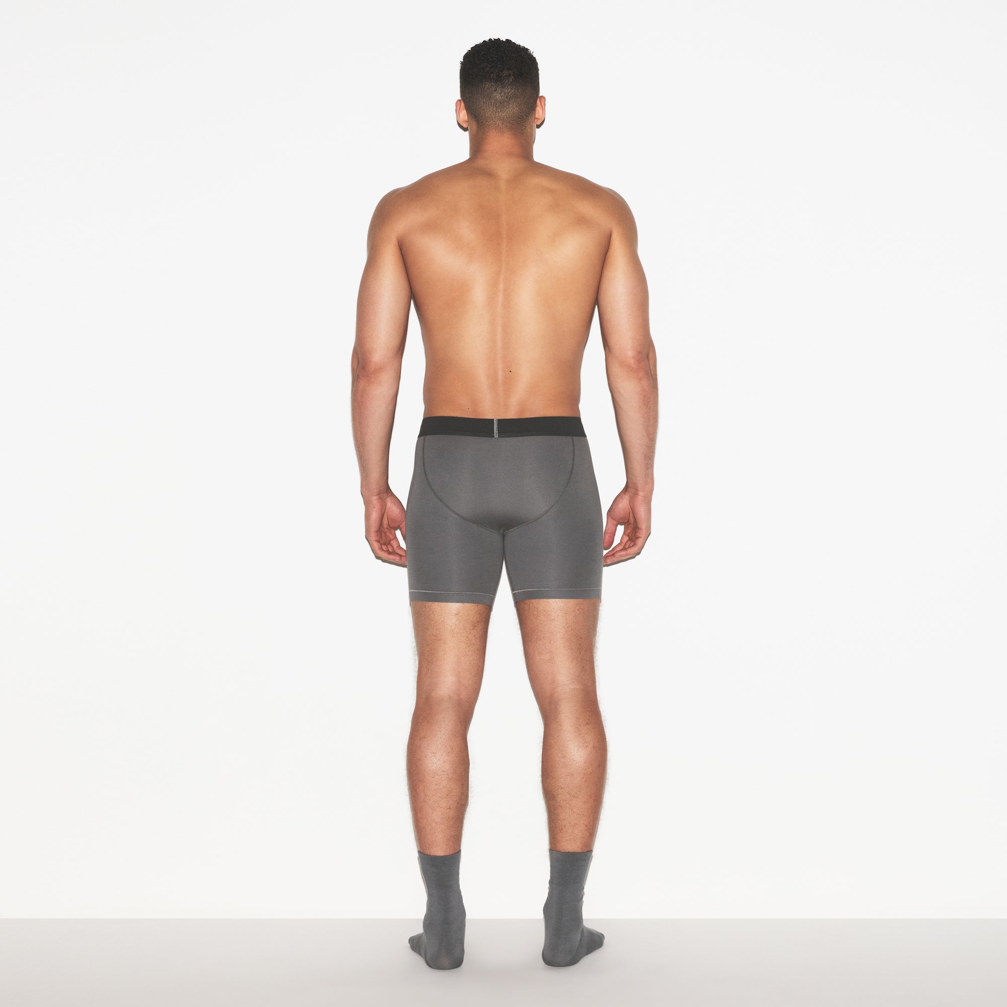 SKIMS COTTON MENS 5 INCH BOXER BRIEF 3-PACK | RUSSET MULTI ON A MODEL FRONT VIEW | FOCUS: 0.0, 1.0, 0.9